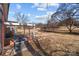 Large backyard with mature trees at 200 11Th St, Spencer, NC 28159