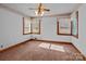 Bright bedroom with wood floors and window views at 200 11Th St, Spencer, NC 28159
