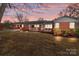 Brick ranch house with carport and porch at 200 11Th St, Spencer, NC 28159