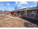 Side view of brick ranch house at 200 11Th St, Spencer, NC 28159