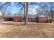 Ranch house with carport and large yard at 200 11Th St, Spencer, NC 28159