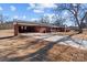 Brick ranch house with a long driveway at 200 11Th St, Spencer, NC 28159