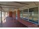 Covered porch with tiled flooring at 200 11Th St, Spencer, NC 28159
