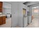 Hallway view of kitchen, laundry and bath at 200 11Th St, Spencer, NC 28159