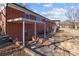 Brick house exterior with covered patio at 200 11Th St, Spencer, NC 28159