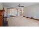 Living room features hardwood floors and large window at 200 11Th St, Spencer, NC 28159