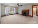 Living room with fireplace and access to bathroom at 200 11Th St, Spencer, NC 28159