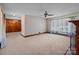 Spacious living room with wood-paneled walls and fireplace at 200 11Th St, Spencer, NC 28159