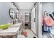Bright bathroom with double sink vanity, modern fixtures, and lots of storage space at 2000 Shannon Bridge Ln, Matthews, NC 28105