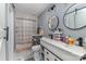 Updated bathroom with double vanity and modern shower at 2000 Shannon Bridge Ln, Matthews, NC 28105