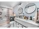 Charming bathroom with double sink vanity, modern fixtures, and a beautifully tiled shower at 2000 Shannon Bridge Ln, Matthews, NC 28105