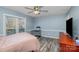 Cozy bedroom with hardwood floors and ample natural light at 2000 Shannon Bridge Ln, Matthews, NC 28105
