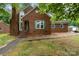 Charming brick home with a well-maintained lawn, inviting entrance, and timeless architectural details at 2000 Shannon Bridge Ln, Matthews, NC 28105
