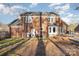 Brick house back view, deck, and patio at 2000 Shannon Bridge Ln, Matthews, NC 28105