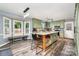 Eat-in kitchen with granite counters, kitchen island, stainless appliances and beautiful bay window bench seat at 2000 Shannon Bridge Ln, Matthews, NC 28105