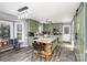 Modern kitchen with granite countertops and green cabinets at 2000 Shannon Bridge Ln, Matthews, NC 28105