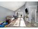 Spacious living room with high ceilings, hardwood floors, and a cozy atmosphere at 2000 Shannon Bridge Ln, Matthews, NC 28105