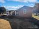 Brick ranch house with covered porch and large yard at 2042 Country Ct, Rock Hill, SC 29732