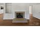 Classic white fireplace with built-in shelving on either side at 2042 Country Ct, Rock Hill, SC 29732
