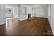 Spacious living room featuring hardwood floors, built-in shelving, and a fireplace at 2042 Country Ct, Rock Hill, SC 29732