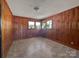 Cozy office space with wood paneled walls and tile flooring at 2042 Country Ct, Rock Hill, SC 29732