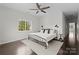Bedroom with minimalist decor and a large window at 212 Bacon Ave, Charlotte, NC 28208