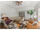 Spacious living room with high ceilings, plush seating, and ample sunlight at 212 Bacon Ave, Charlotte, NC 28208