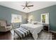 Serene bedroom with natural light, neutral tones, and hardwood floors at 212 Bacon Ave, Charlotte, NC 28208