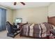 Bright bedroom with a bed, desk, and racing simulator at 2720 Hill Top Dr, Salisbury, NC 28147