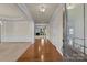 Hardwood floor entryway with views into the living room and formal dining room at 3027 Arsdale Rd # 75, Waxhaw, NC 28173