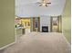 Open living room showcasing a fireplace and kitchen access at 3027 Arsdale Rd # 75, Waxhaw, NC 28173