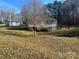 House backyard with detached shed and mature trees at 3285 Henry Knob Rd, Clover, SC 29710