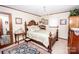 Charming bedroom with a wooden bed frame and soft color scheme at 3510 Flint Dr, Statesville, NC 28677