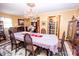 Formal dining room with a large table, chandelier, and decorative china cabinet at 3510 Flint Dr, Statesville, NC 28677