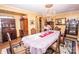 Formal dining room with a large table, chandelier, and decorative china cabinet at 3510 Flint Dr, Statesville, NC 28677