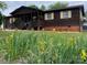 Charming single-story home with lovely flowerbeds and a cozy front porch creates a welcoming curb appeal at 3510 Flint Dr, Statesville, NC 28677