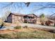 Brown house with a covered porch and landscaping at 3510 Flint Dr, Statesville, NC 28677