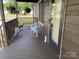Cozy front porch features comfortable seating and charming decor, perfect for enjoying the outdoors at 3510 Flint Dr, Statesville, NC 28677
