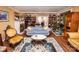 Bright living room with hardwood floors, comfortable seating, and a fireplace at 3510 Flint Dr, Statesville, NC 28677