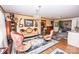 Spacious living room with antique furniture and a chandelier at 3510 Flint Dr, Statesville, NC 28677