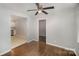 Open dining area with hardwood floors and access to the kitchen at 3843 Foxford Pl, Charlotte, NC 28215