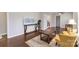Comfortable living space with hardwood floors, stylish decor, and plenty of natural light at 3843 Foxford Pl, Charlotte, NC 28215