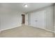 Spacious bedroom with double doors and wall-to-wall carpet at 4376 Foxfield Ct, Harrisburg, NC 28075