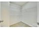 Walk-in closet with wire shelving, offering great storage space at 4376 Foxfield Ct, Harrisburg, NC 28075