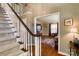 Living room view from entryway, featuring hardwood floors at 5438 Somerset Ln, Harrisburg, NC 28075