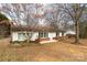 House exterior showcasing a brick base and vinyl siding at 550 Brumley Rd, Mooresville, NC 28115