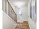 Bright entryway with staircase, wood floors, and neutral walls at 7228 Hodges Meadow Ln, Charlotte, NC 28213