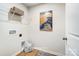 Bright laundry room with shelving and storage at 7228 Hodges Meadow Ln, Charlotte, NC 28213