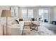 Spacious living room with L-shaped sectional sofa and sliding glass door at 7228 Hodges Meadow Ln, Charlotte, NC 28213