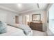 Main bedroom with ensuite bathroom and dresser at 7228 Hodges Meadow Ln, Charlotte, NC 28213